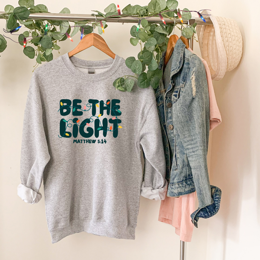 Be The Light - Christian Christmas Sweatshirt Matthew 5:14